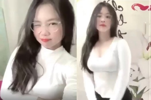 Cô ta thích show hàng vú to khi mặc đồ trắng